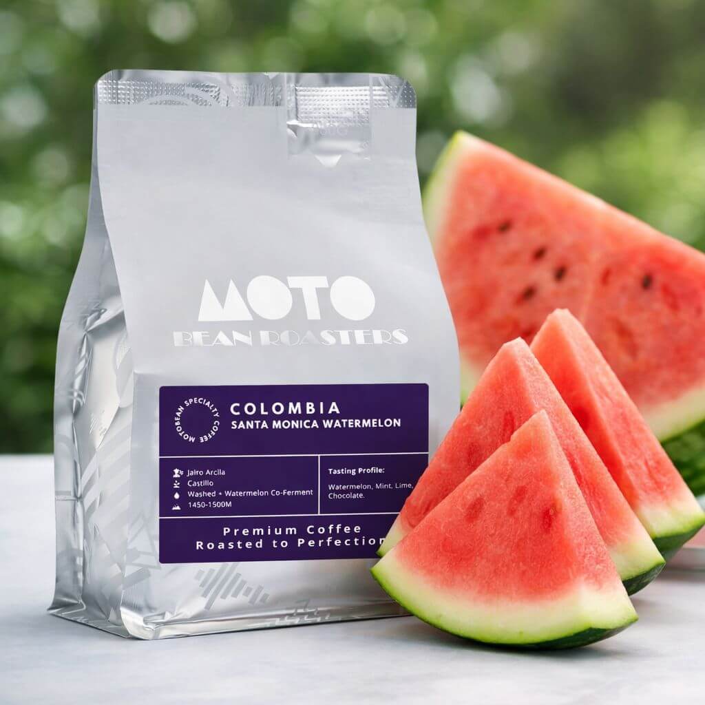 Jairo Arcila Co-Fermented Watermelon Coffee Beans alongside fresh slices of juicy watermelon. Roasted in Melbourne by Motobean Specialty Coffee Roasters. 250gm.