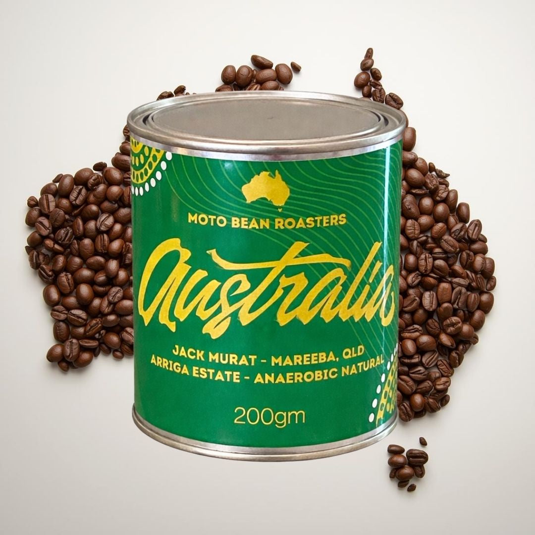 Jack Murat Australian Coffee Beans  from Mareeba QLD Arriga Estate. Anaerobic Roasted by Moto Bean Specialty Coffee Roasters.  200gm Tin.    Map of Australia made of Roasted Coffee Beans in Background.