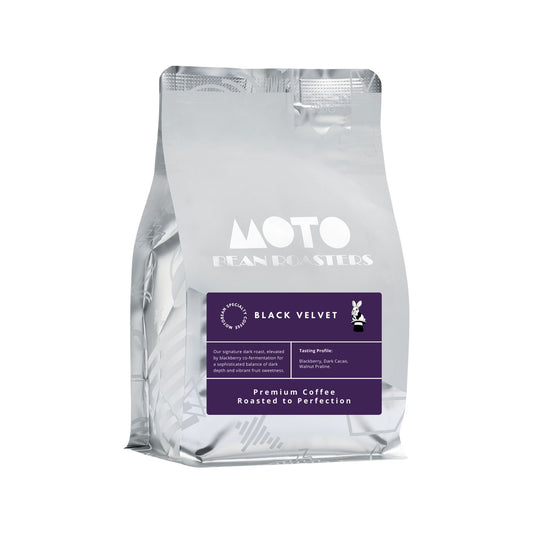 Motobean Specialty Coffee Roasters Black Velvet co-ferment coffee blend.  We've infused the enchanting Jairo Arcila Blackberry into our signature dark roast.  The outcome? sophisticated, bold, and undeniably smooth—a velvet cloak for your morning ritual. 250g beans or ground.
